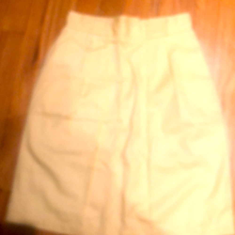 I have this mini skirt from Nordstrom brand name Corbin Ltd light gold yellow